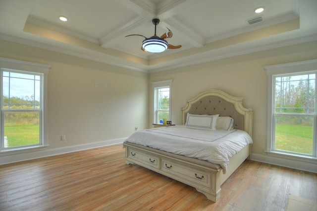 bedroom featuring ceiling fan, coffered ceiling, light hardwood / wood-style flooring, beamed ceiling, and crown molding