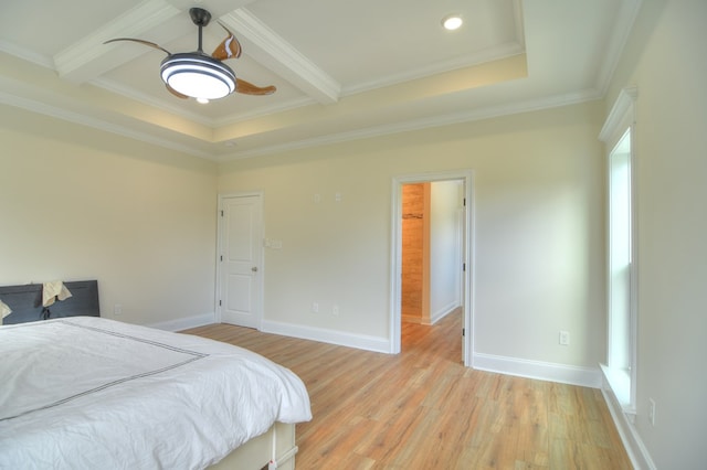 bedroom with beamed ceiling, ceiling fan, light hardwood / wood-style floors, and ornamental molding