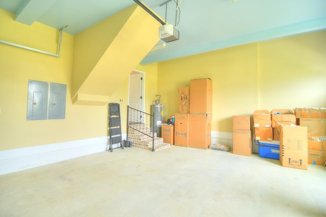 garage with electric panel, water heater, and a garage door opener