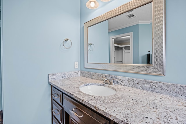 4740 Amelia Cir, Hahira, GA 31632 - bathroom featuring vanity and ornamental molding
