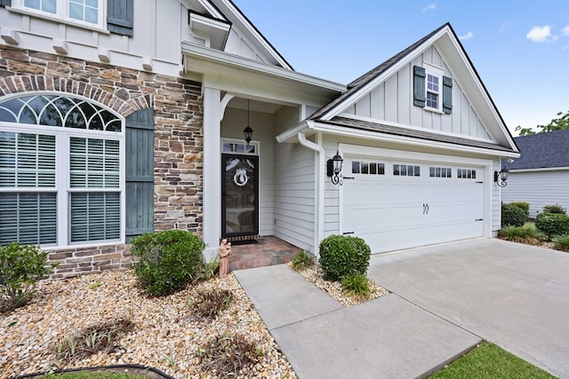 4740 Amelia Cir, Hahira, GA 31632 - view of front of property with board and batten siding, stone siding, and concrete driveway