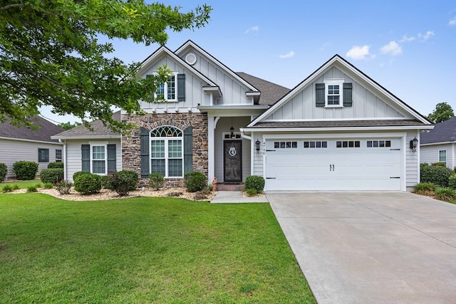 4740 Amelia Cir, Hahira, GA 31632 - craftsman inspired home with board and batten siding, a front lawn, stone siding, and driveway