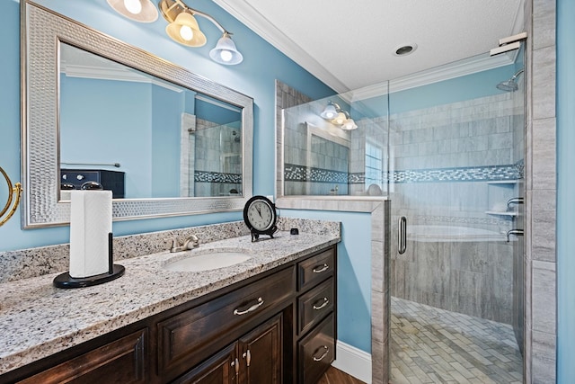 4740 Amelia Cir, Hahira, GA 31632 - full bathroom with ornamental molding, a stall shower, vanity, and a textured ceiling