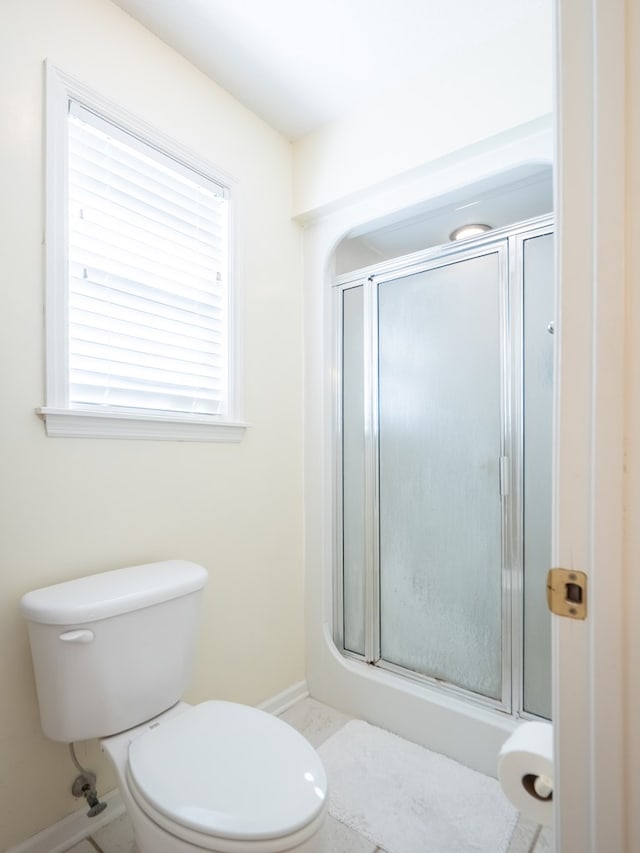 2951 Findley Chase, Valdosta, GA 31605 - full bathroom featuring baseboards, toilet, and a stall shower