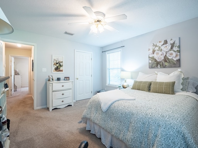 2951 Findley Chase, Valdosta, GA 31605 - bedroom featuring a textured ceiling, ceiling fan, visible vents, and light carpet