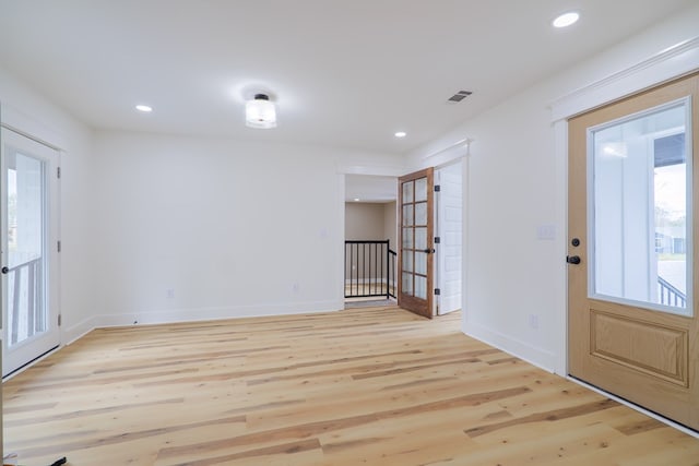 foyer featuring light wood-type flooring