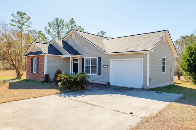 single story home featuring a garage