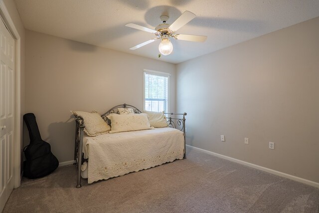 4604 Rustic Ridge Rd, Valdosta, GA 31602 - bedroom featuring carpet floors, ceiling fan, and a closet