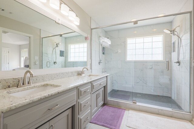 4604 Rustic Ridge Rd, Valdosta, GA 31602 - full bath featuring a marble finish shower and double vanity