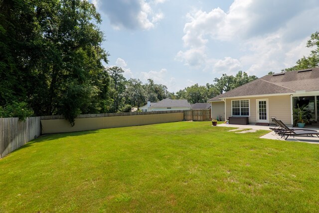 4604 Rustic Ridge Rd, Valdosta, GA 31602 - fenced backyard with a patio area