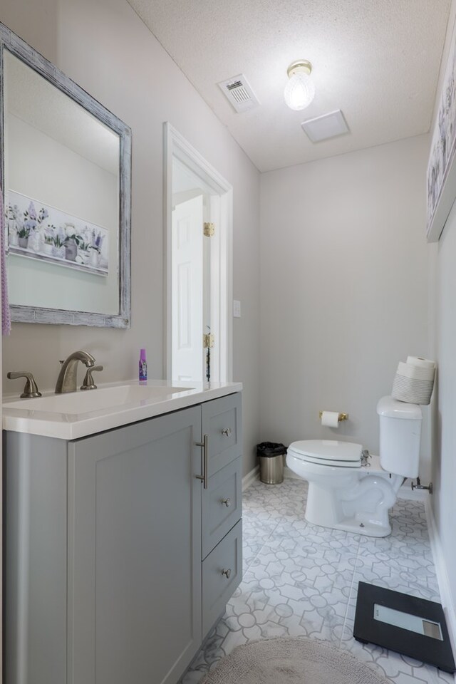 4604 Rustic Ridge Rd, Valdosta, GA 31602 - bathroom with toilet and vanity