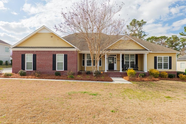 view of front of house featuring a front lawn and a porch