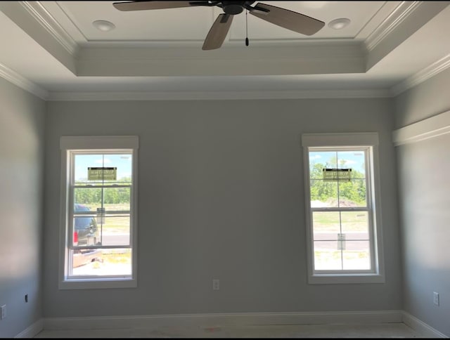 3864 Lu Ln, Hahira, GA 31632 - empty room featuring ornamental molding, a raised ceiling, baseboards, and a ceiling fan