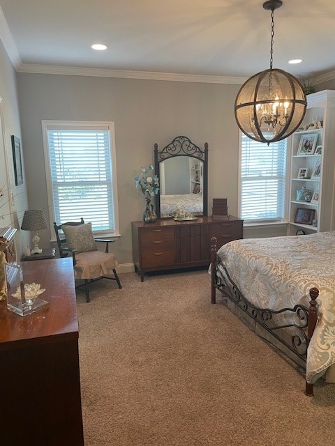 4686 Rudy Way, Hahira, GA 31632 - bedroom featuring a chandelier, multiple windows, light colored carpet, and ornamental molding