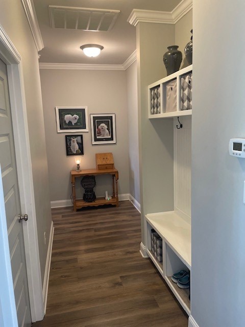 4686 Rudy Way, Hahira, GA 31632 - mudroom with ornamental molding, dark wood-style floors, and baseboards