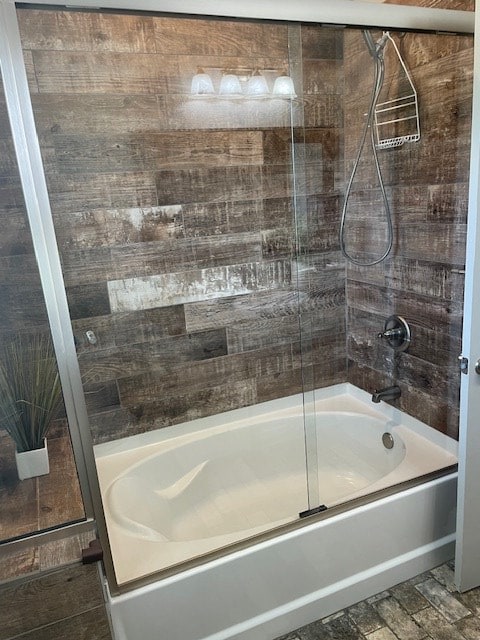 4686 Rudy Way, Hahira, GA 31632 - full bathroom featuring bath / shower combo with glass door