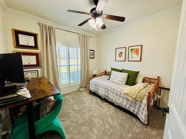 carpeted bedroom featuring a ceiling fan and ornamental molding