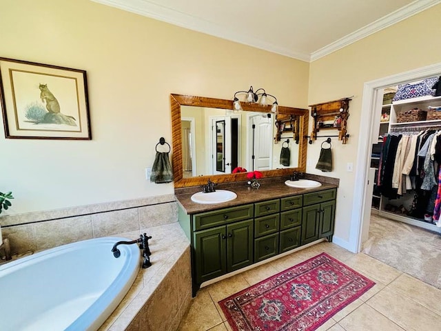 bathroom with crown molding, tile patterned floors, and a sink