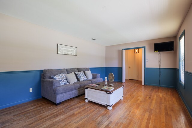 living room with hardwood / wood-style flooring