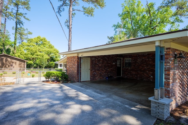 view of home's exterior with a carport