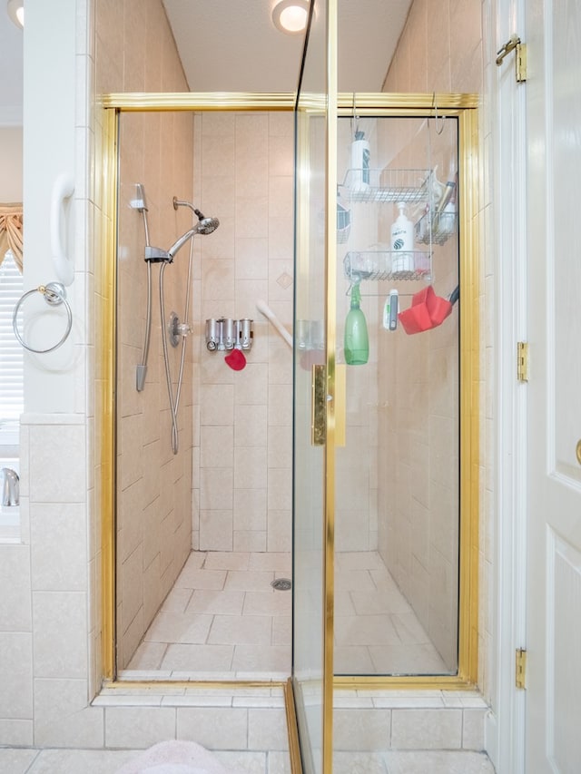 full bathroom with a stall shower