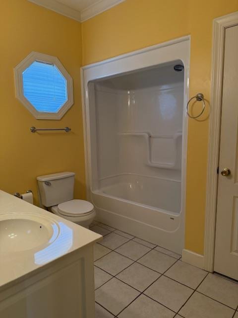 full bathroom with tile patterned flooring, toilet, vanity, and ornamental molding