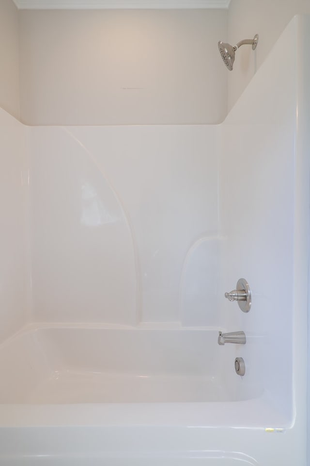 bathroom with shower / tub combination