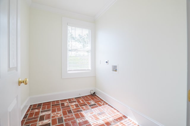 200 E College St, Valdosta, GA 31602 - clothes washing area with laundry area, ornamental molding, hookup for a washing machine, brick floor, and electric dryer hookup