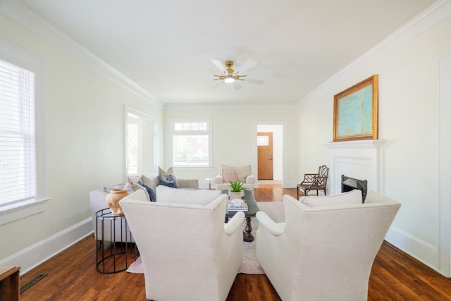 200 E College St, Valdosta, GA 31602 - living area featuring dark wood-type flooring, a ceiling fan, and ornamental molding