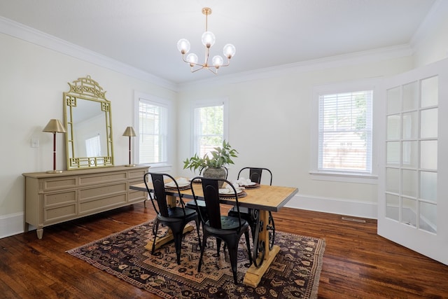 200 E College St, Valdosta, GA 31602 - dining room with crown molding, dark wood-style flooring, and a chandelier