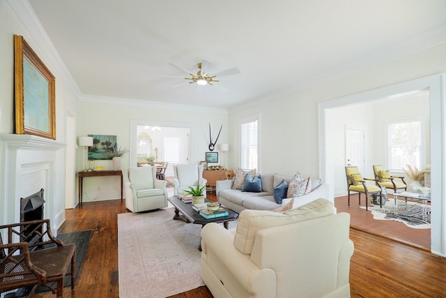 200 E College St, Valdosta, GA 31602 - living room featuring ornamental molding, a fireplace with flush hearth, ceiling fan, and dark wood-style floors