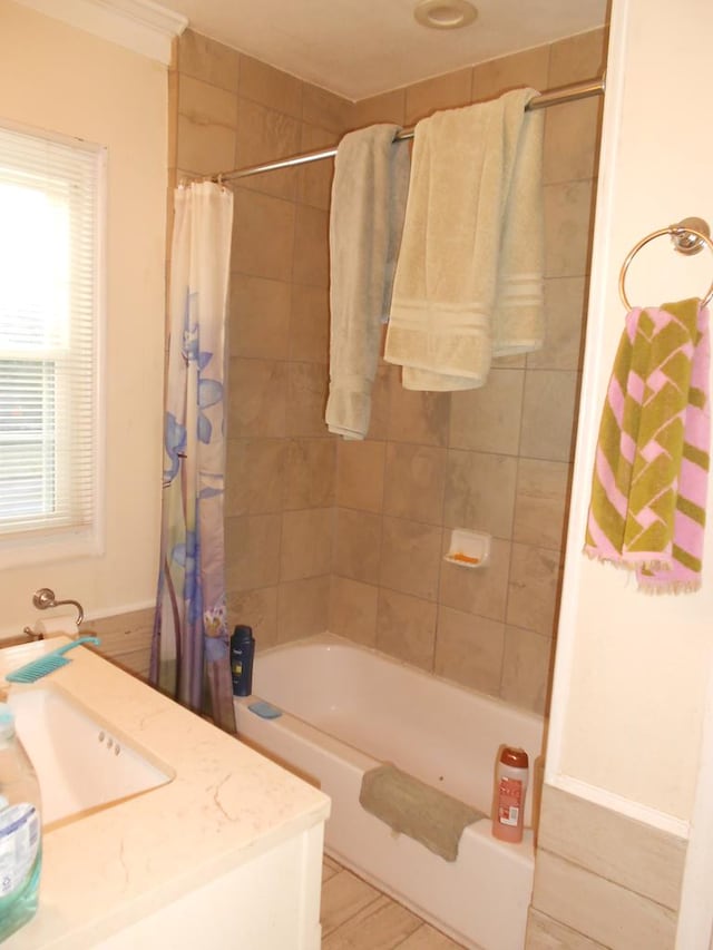 bathroom with vanity and shower / bath combo with shower curtain