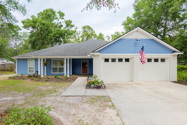 4608 Rustic Ridge Rd, Valdosta, GA 31602 - ranch-style house with a garage, driveway, brick siding, a porch, and a shingled roof