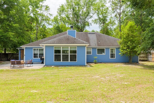 4608 Rustic Ridge Rd, Valdosta, GA 31602 - rear view of house featuring a patio, a chimney, and a shingled roof
