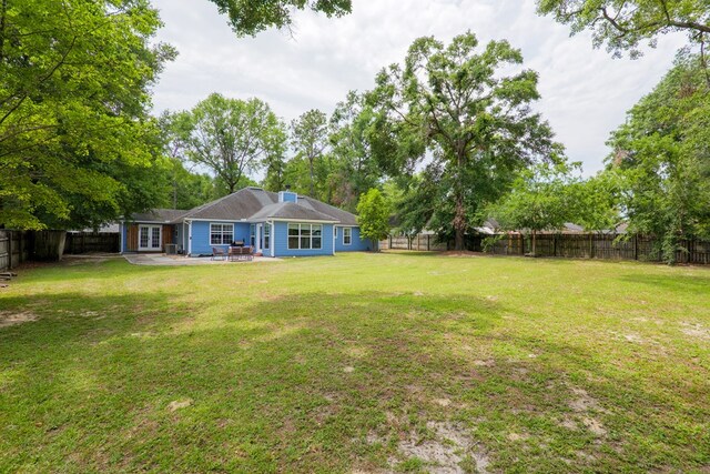4608 Rustic Ridge Rd, Valdosta, GA 31602 - view of yard featuring french doors and a patio area