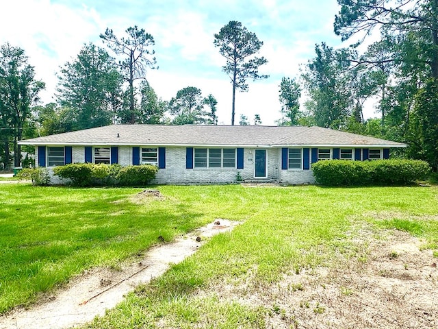 2106 Jerry Jones Dr, Valdosta, GA 31602 - single story home featuring a front yard and brick siding