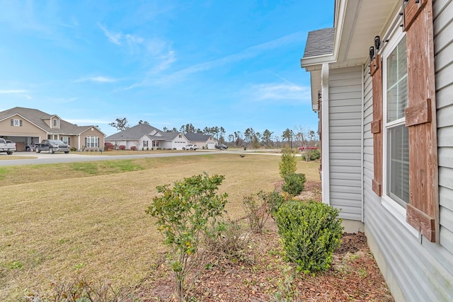 view of yard with a residential view