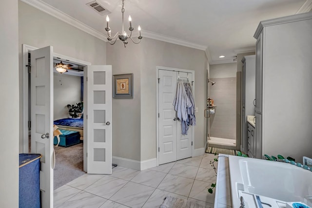 foyer with marble finish floor, visible vents, ornamental molding, baseboards, and ceiling fan with notable chandelier