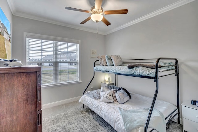 bedroom featuring a ceiling fan, light carpet, crown molding, and baseboards