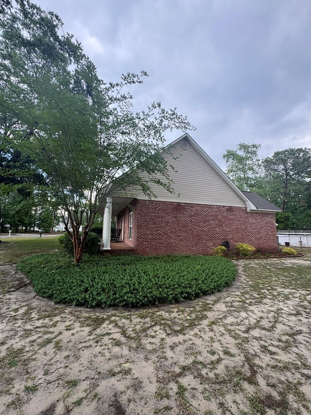 1708 Jimmy St, Adel, GA 31620 - view of property exterior with brick siding
