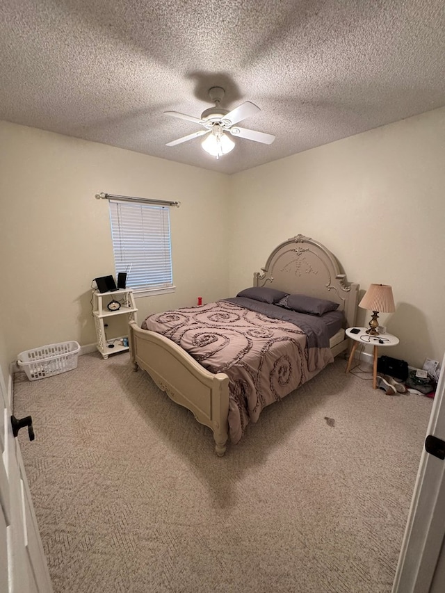 1708 Jimmy St, Adel, GA 31620 - bedroom with carpet flooring, a ceiling fan, and a textured ceiling