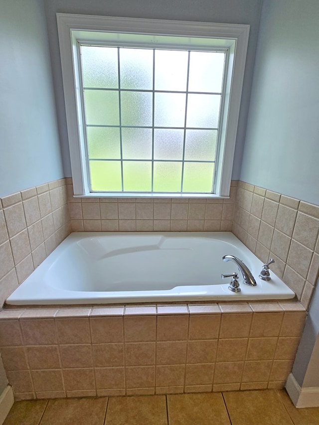 3265 Summer Meadows Rd, Valdosta, GA 31601 - bathroom featuring a bath and tile patterned floors