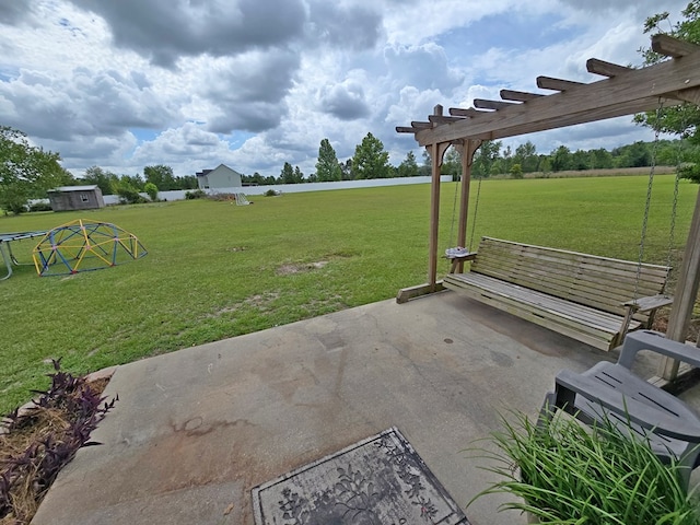 3265 Summer Meadows Rd, Valdosta, GA 31601 - view of green lawn featuring a patio area and a pergola
