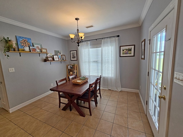 3265 Summer Meadows Rd, Valdosta, GA 31601 - dining room featuring a chandelier, light tile patterned flooring, crown molding, and healthy amount of natural light