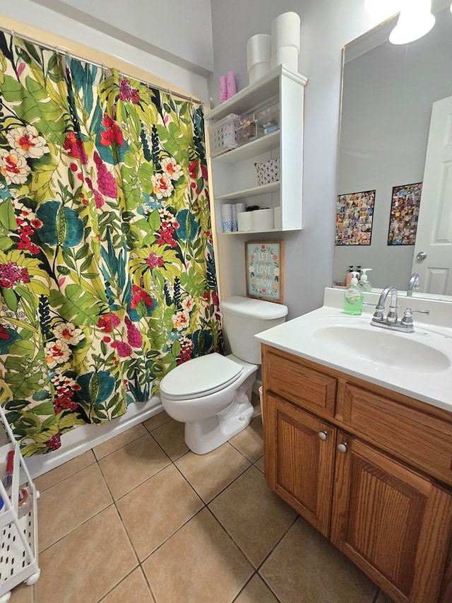 3265 Summer Meadows Rd, Valdosta, GA 31601 - bathroom with vanity, tile patterned flooring, and toilet