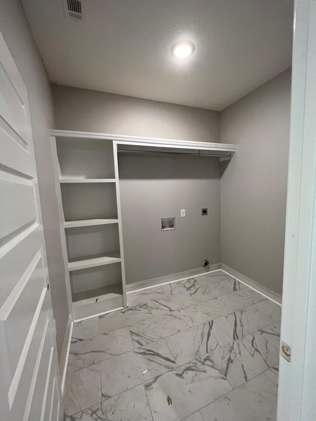 laundry area featuring hookup for a washing machine and hookup for an electric dryer