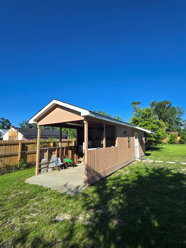 617 Ledgedale Cir, Valdosta, GA 31602 - rear view of property with a patio