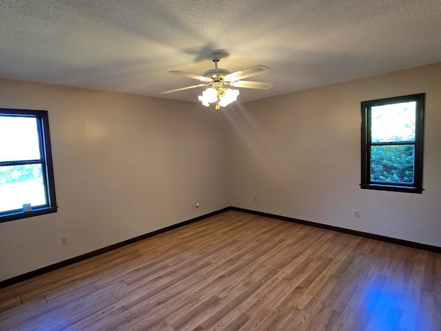 617 Ledgedale Cir, Valdosta, GA 31602 - unfurnished room with plenty of natural light, light wood finished floors, a textured ceiling, and ceiling fan