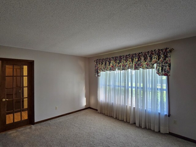 617 Ledgedale Cir, Valdosta, GA 31602 - unfurnished room with light carpet and a textured ceiling
