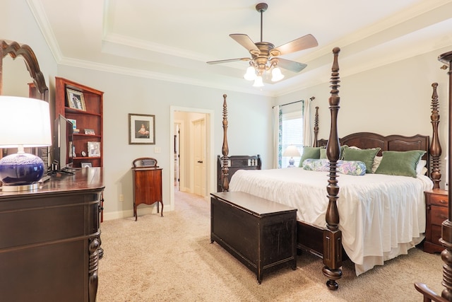 4773 Pawnee Dr, Hahira, GA 31632 - bedroom with a tray ceiling, light colored carpet, ornamental molding, a ceiling fan, and baseboards